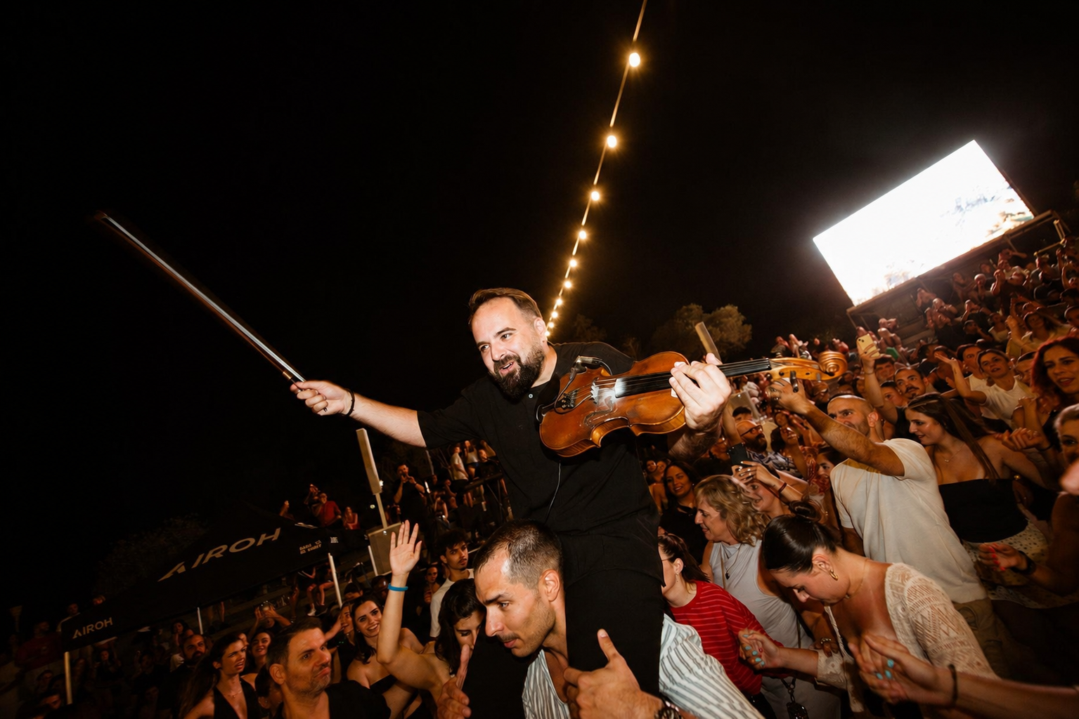 Live violin performance among the Fuse Festival audience
